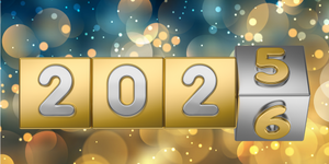 Symbolgrafik: Jahreswechsel - Zahlen 2025 und 2026 vor goldenem Hintergrund